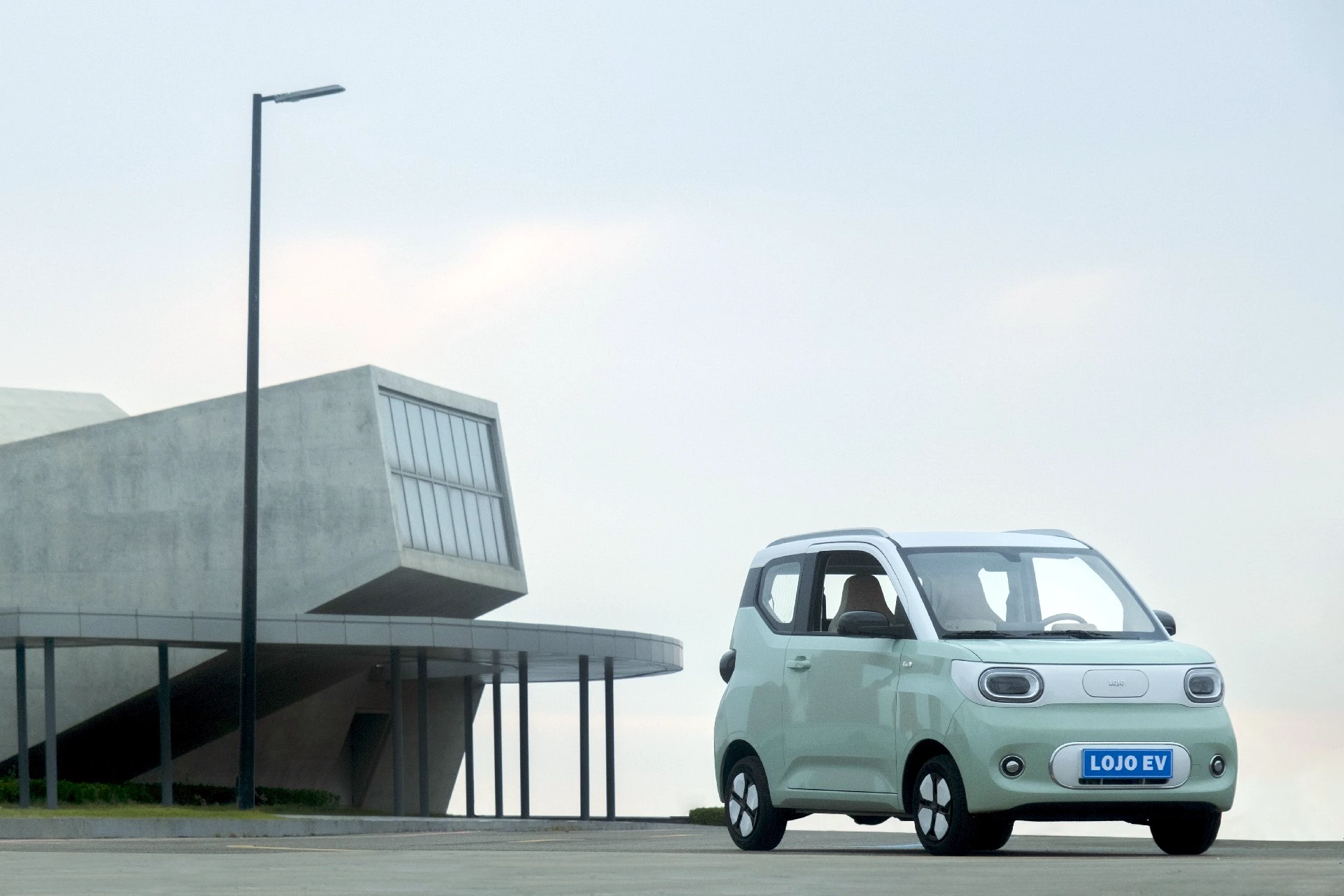 LOJO electric vehicle at night